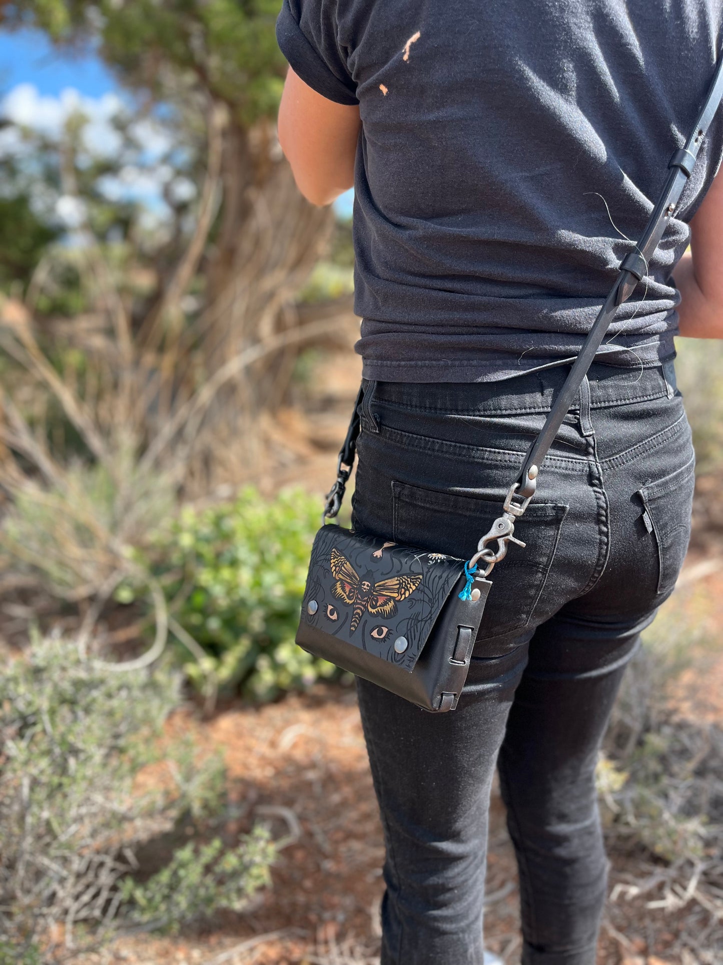 These bags all come with an adjustable crossbody strap that can be removed.