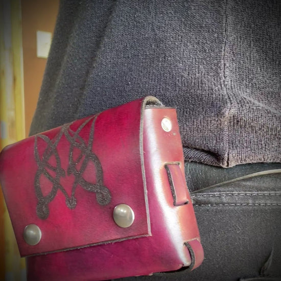 Check out this small pouch attached to my belt!