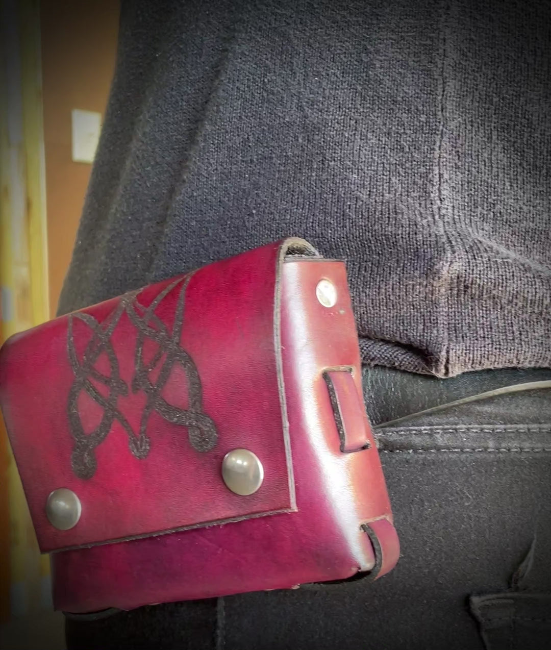 Check out this small pouch attached to my belt!